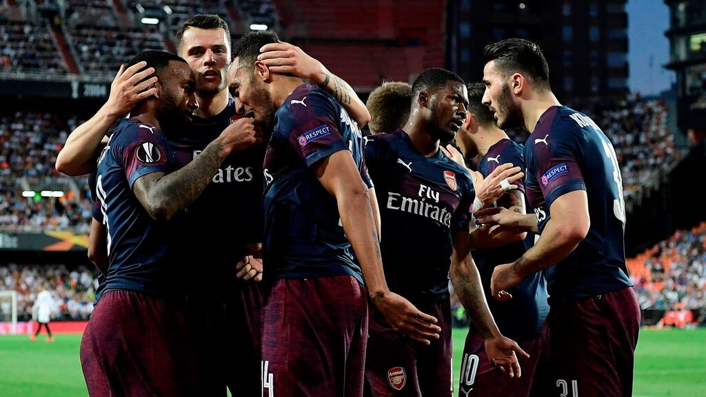 Pierre-Emerick Aubameyang celebrates a goal with his Arsenal teammates at the Mestalla stadium in Valencia. Photograph: Getty Images