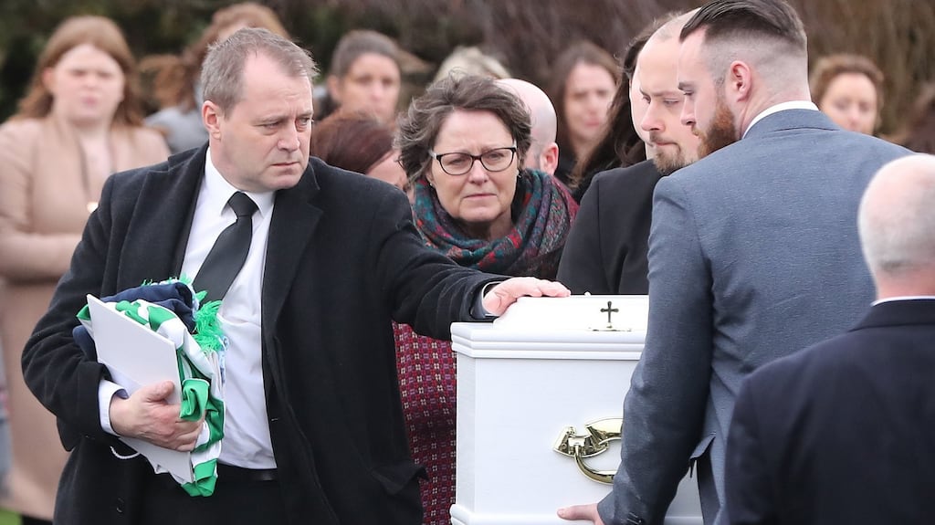 Andrew McGinley during the funeral of his children, Conor (9), Darragh (7) and Carla (3), at the Church of the Holy Family in Rathcoole, Dublin. Photograph: Niall Carson/PA Wire