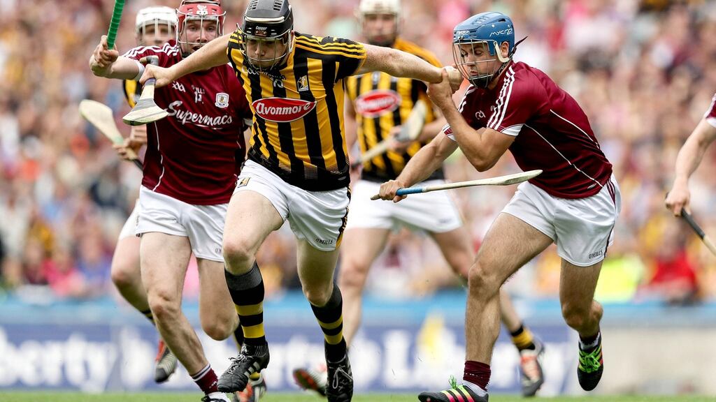 Kilkenny’s Walter Walsh tries to get away from Galway’s Cathal Mannion and Johnny Coen. Photograph: Ryan Byrne