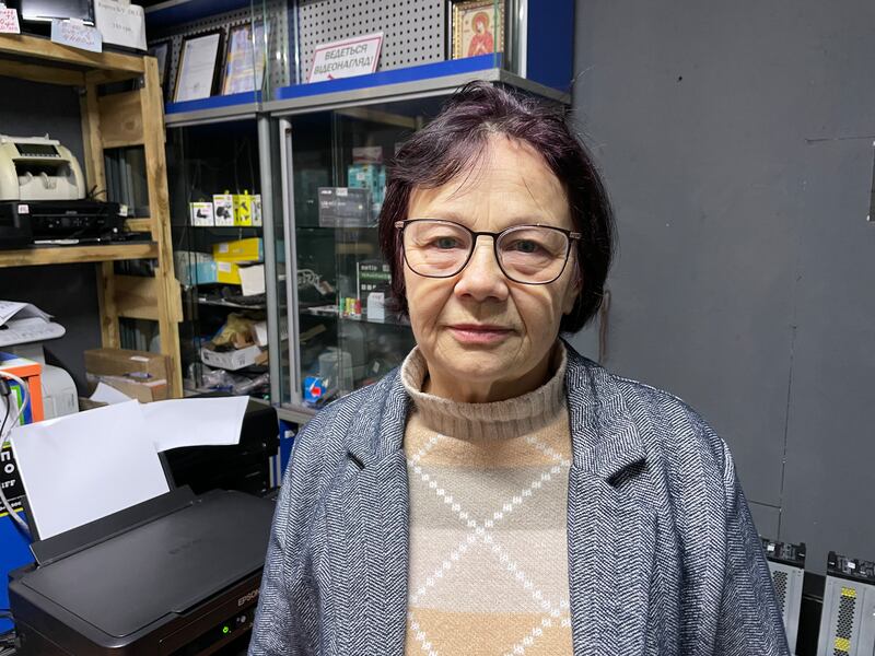 Raisa Selyunina in the appliance repair store where she works in Bucha, near Kyiv. It relies on a generator for consistent power amid major blackouts across Ukraine. Photograph: Daniel McLaughlin