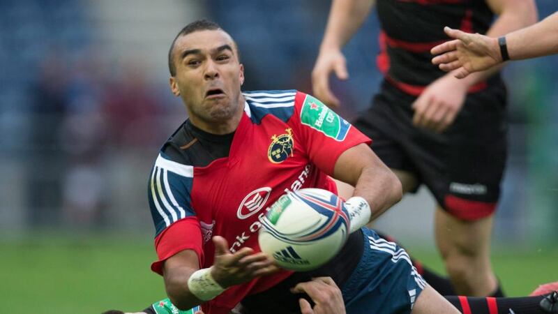 Munster’s Simon Zebo is tackled by Edinburgh’s Cornell du Preez at Murrayfield. Photograph: Jeff Holmes/PA Wire