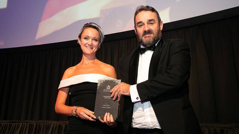 Claire Solon, Head of Property, Friends First & Past President, SCSI presents the Housing Project of the Year award to Frank Cooney, Cooney Architects.