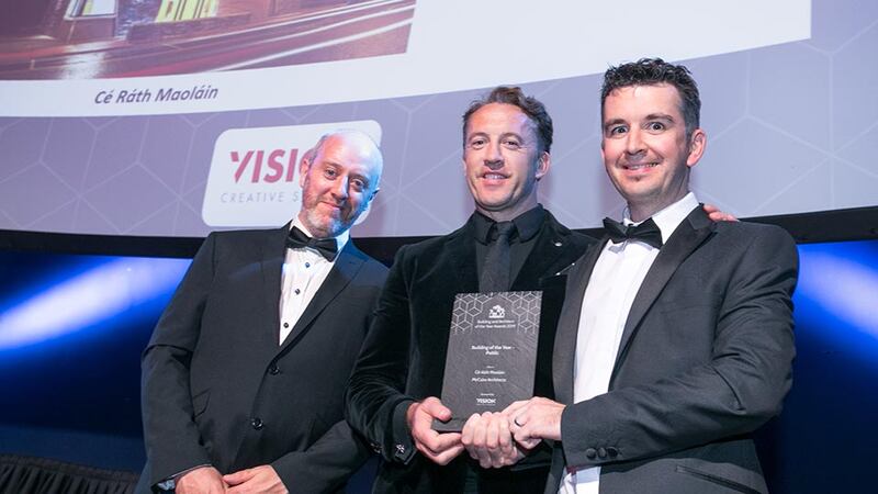 Aaron O’ Grady, Owner, Vision Creative Studios presents the Building of the Year - Public award to John Breslin & Declan McCabe, McCabe Architects.