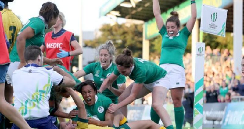 Sophie Spence scores (centre, with ball) a try as her team mates celebrate during Ireland's Women's Rugby World Cup match against Australia in UCD, Dublin on August 9th, 2017. Photograph: INPHO/Dan Sheridan