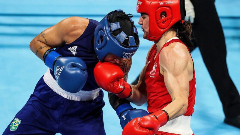 Kellie Harrington lands an uppercut in her lightweight gold medal bout against Brazil’s Beatriz Ferreira at the Tokyo Olympics. Photograph: Bryan Keane/Inpho