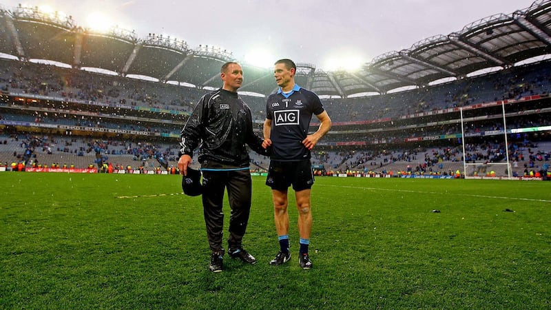 Dublin manager Jim Gavin and Stephen Cluxton soak up the atmosphere in an emptying Croke Park after their All-Ireland final win over Kerry last September. Photograph: Donall Farmer