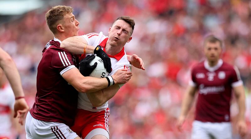 Galway’s Dylan McHugh and Gareth McKinless of Derry in action during Saturday's semi-final. Photograph: Ryan Byrne/Inpho