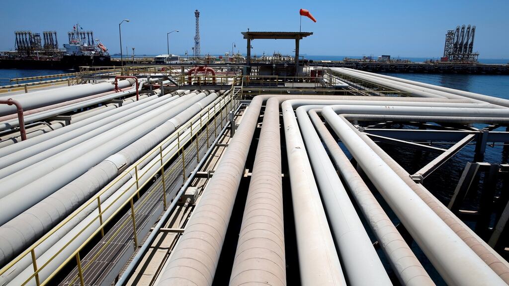 An oil tanker is loaded at Saudi Aramco’s Ras Tanura oil refinery and oil terminal in Saudi Arabia.
