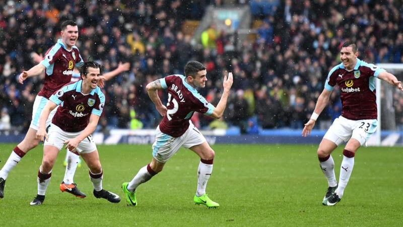 Robbie Brady of Burnley celebrates scoring his side’s first goal with team-mates during the Premier League match against Chelsea at Turf Moor. Photograph: Mike Hewitt/Getty Images