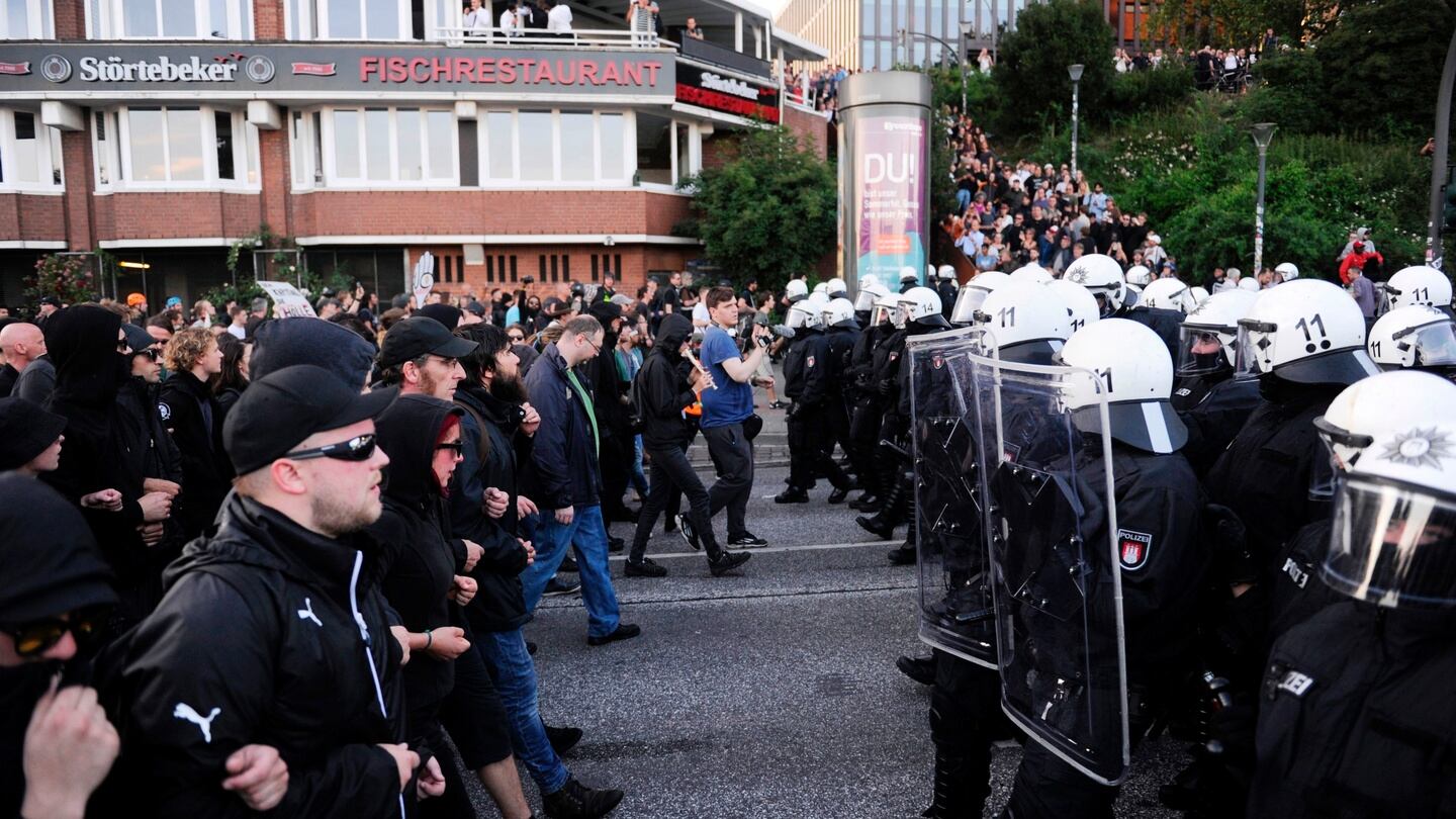 Protesters face riot police during a rally against the G20 summit in Hamburg, northern Germany. Photograph: Steffi Loos/AFP/Getty Images