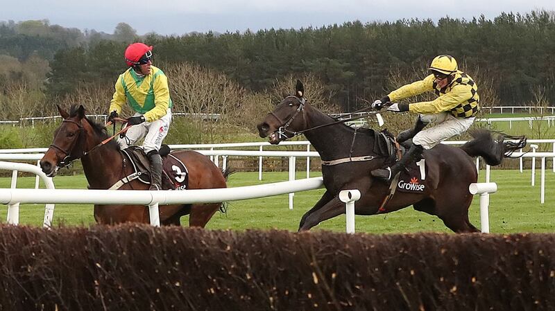 Al Boum Photo and Jockey Paul Townend collide with Finian’s Oscar on day one at Punchestown. Photograph: Niall Carson/PA