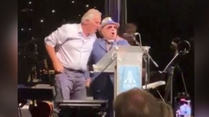 Democratic Unionist Party MP Ian Paisley and Van Morrison on stage at the Europa Hotel