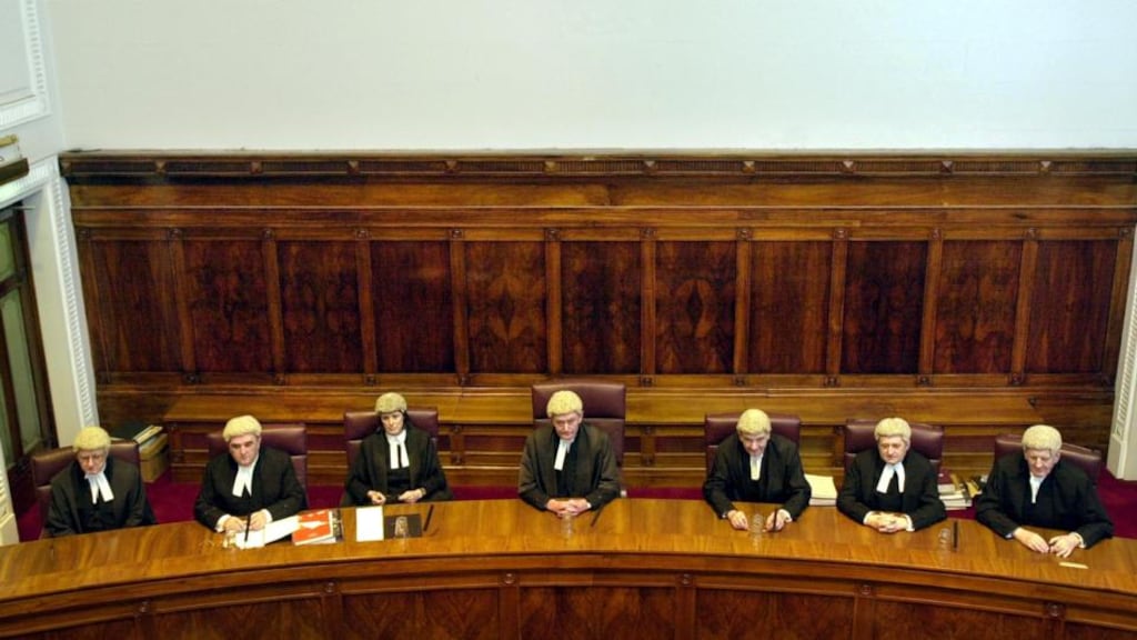 Supreme Court judges at an appeal by the State against a landmark decision in favour of Kathryn Sinnot and her son Jamie, who has autistm, in 2001. It was the first time seven Supreme Court judges had assembled to determine a constitutional issue. From left: Hugh Geoghegan, John Murray, Susan Denham, the then chief justice Ronan Keane, Frank Murphy, Adrian Hardiman and Nial Fennelly. Photograph: Bryan O’Brien