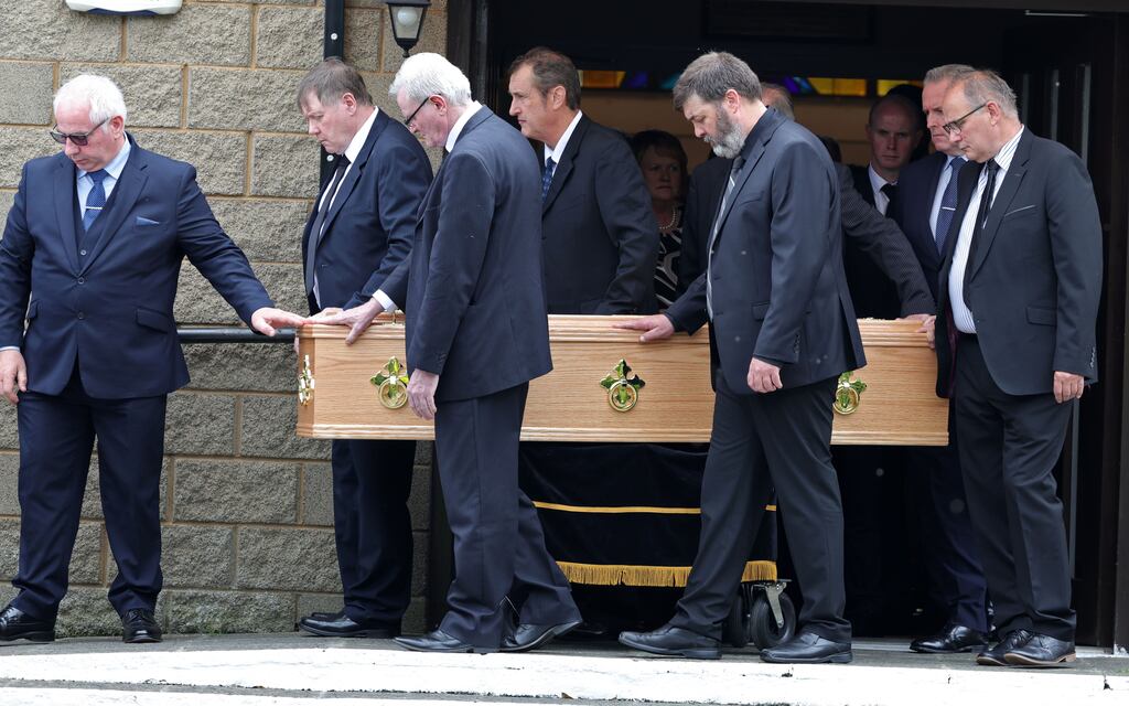 The remains of Bishop Brendan Comiskey are taken from Sacred Heart Church in Clondalkin. Photograph: Colin Keegan/Collins