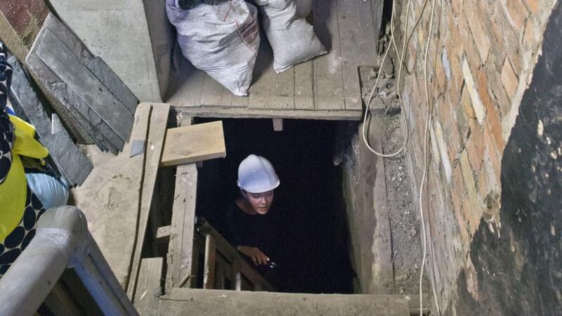 Sunni Goodson, a conservation specialist with Mesh Architects, in the basement in the hallway of the 17th century house on Aungier Street, Dublin. Photograph: Brenda Fitzsimons