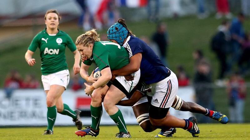 Ireland’s Niamh Briggs is tackled by Coumba Diallo and Safi N’Diaye of France in Pau. Photograph: James Crombie/Inpho