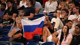 Tennis fans seen hoisting Russian flag at Australian Open despite ban