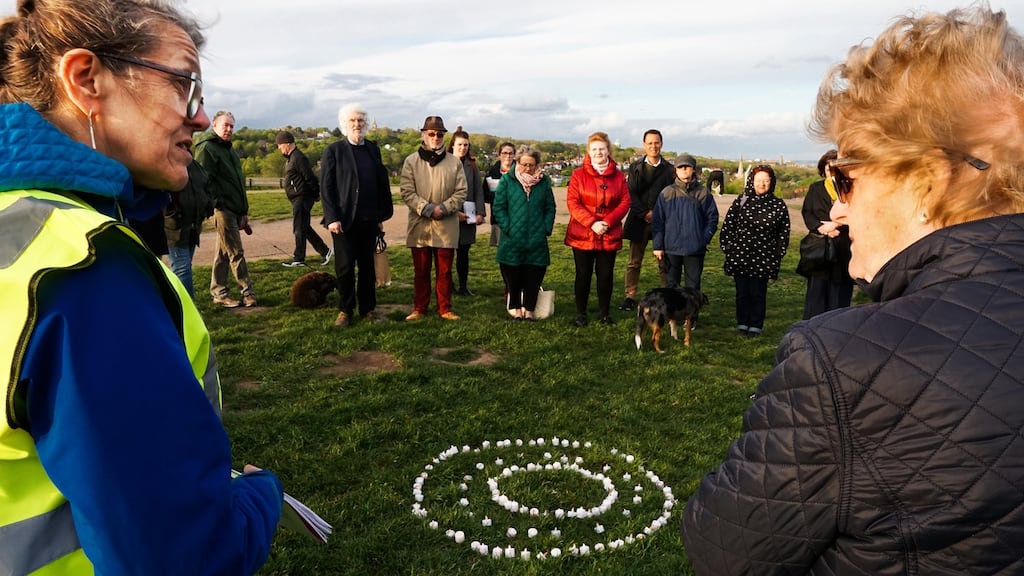 Vigil organiser Nuala Flynn (left) with other participants at a memorial event on Hampstead Heath for Peter Tyrell, who suffered years of abuse at Letterfrack industrial school. Photograph: Joanne O’Brien