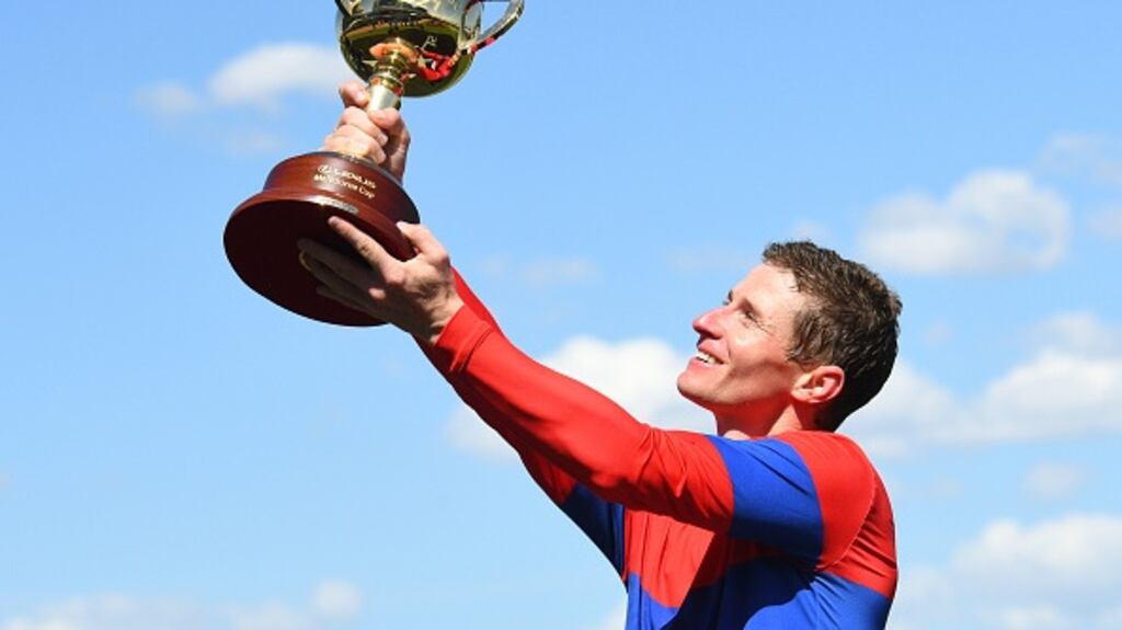 James McDonald poses with the trophy after riding Verry Elleegant to win Race 7, the Lexus Melbourne Cup, during 2021 Melbourne Cup Day at Flemington Racecourse. Photograph: Vince Caligiuri/Getty Images