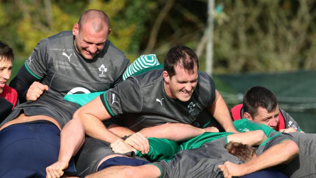 Dan Tuohy (left) and Devin Toner (centre) hard at work at Ireland’s squad session at Carton House in Co Kildare. Photograph: Billy Stickland/Inpho