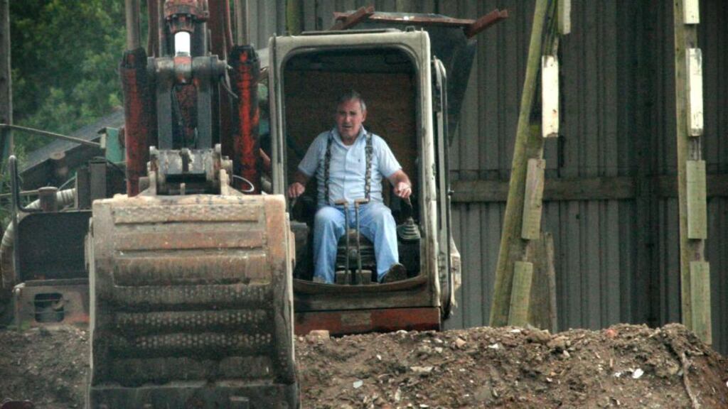 Donegal-born Hugh O’Donnell in a digger on his illegal dump in Berkshire. His dump site was the size of five football pitches.