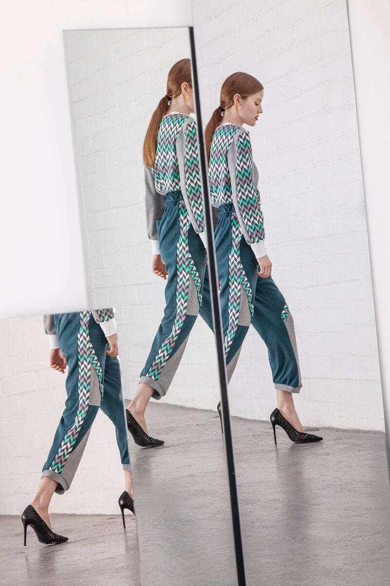 Graphic print and organic jersey top with raised seams €165, graphic print tencel and organic jersey joggers €179, braided stilettos Zara €55.95, triangle earring Aliquo, Om Diva €68