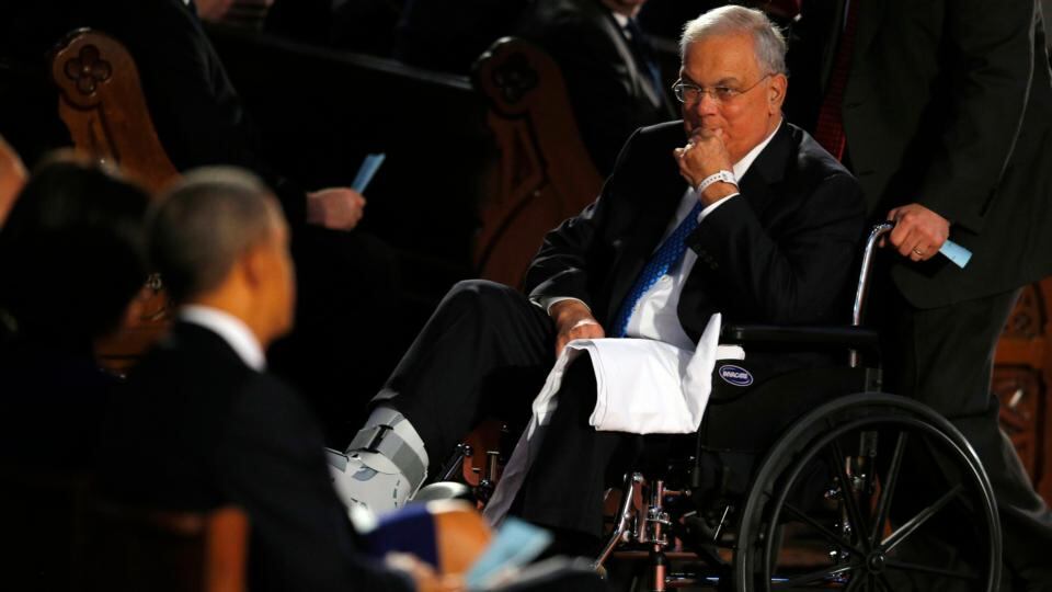 Boston Mayor Tom Menino (right) takes his place near US president Barack Obama during an interfaith memorial service for the victims of the bombing at the Boston Marathon in Boston. Photograph: Brian Snyder/Reuters