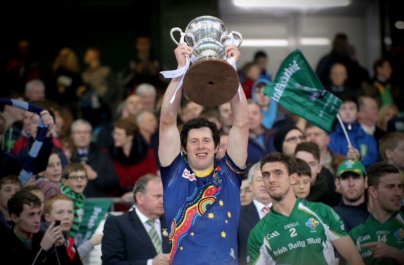 Seán Cavanagh lifts the Cormac McAnallen Cup in 2013. Photograph: James Crombie/Inpho