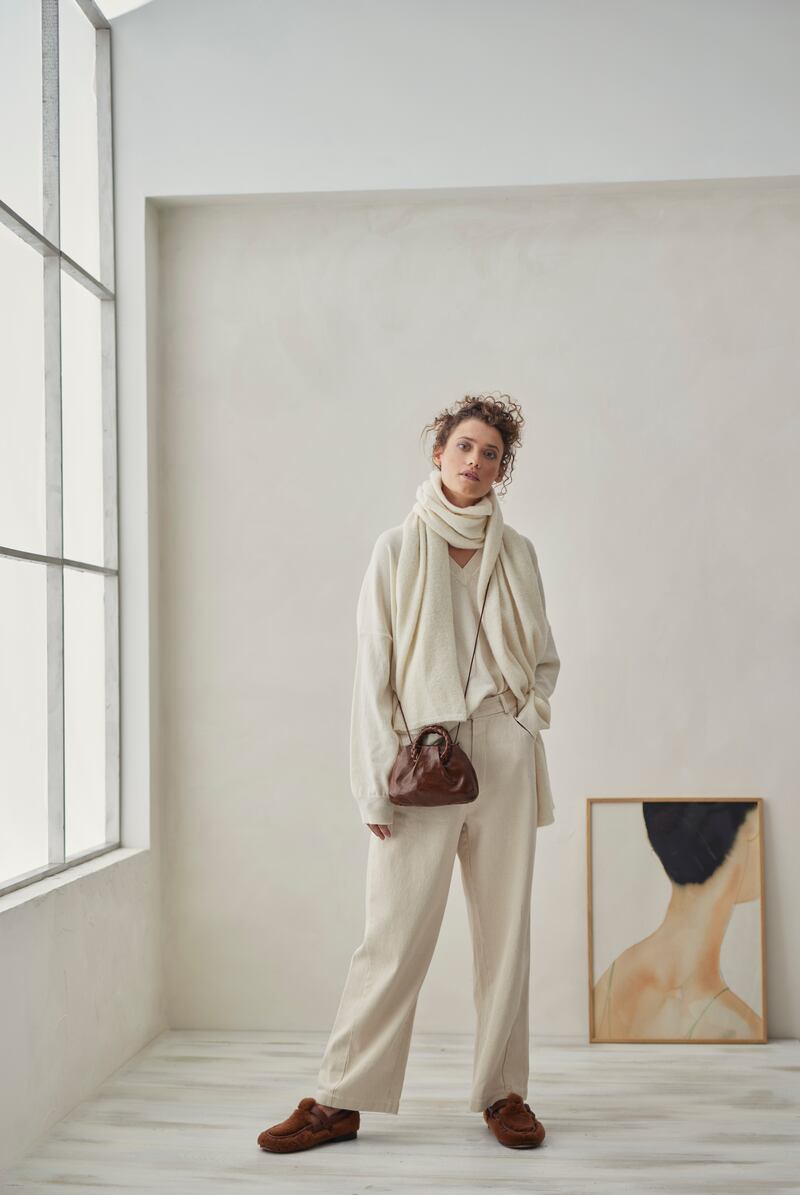 Alpaca sweater €360, trousers €240, scarf €145 by Cordera, glossy leather bag €330 by Hereu. Green camisole print €110 by Paper Collective. Photograph: Dylan Madden