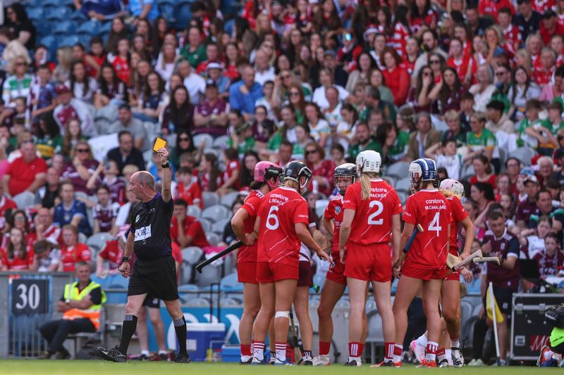 Referee Justin Heffernan shows Cork's Laura Hayes a yellow card. Photograph: Ben Brady/Inpho