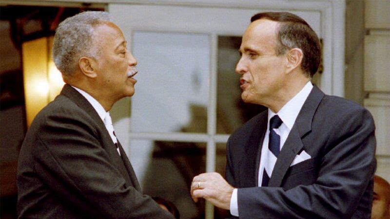 Mayor David Dinkins and mayor-elect Rudolph Giuliani outside City Hall a day after election day in 1993. Photograph: Don Emmert/AFP via Getty Images