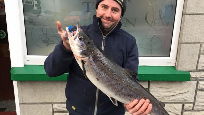 Niall Sweeney with the first Lough Melvin salmon of the season. It was caught off Bilberry Island and weighed 9lb 9oz