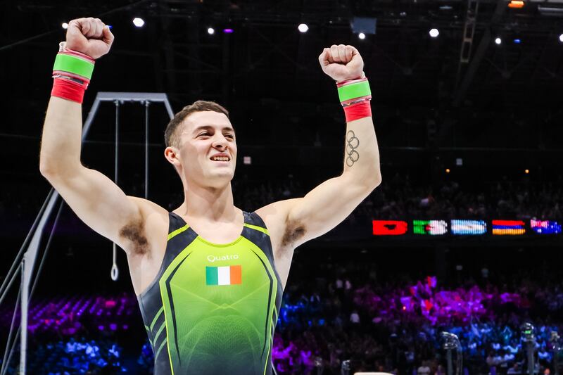 Rhys McClenaghan celebrates retaining his title at the World Gymnastics championships in Antwerp in October. He belongs to a generation of Irish athletes that are knocking down walls. Photograph: INPHO