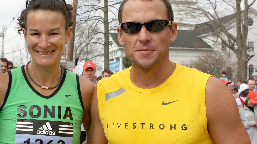 I only met Lance once, briefly, at the start of the 2008 Boston Marathon, when someone asked could they take a photo.