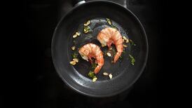 The tyranny of small-plate dining: what’s the best way to split these two prawns five ways?