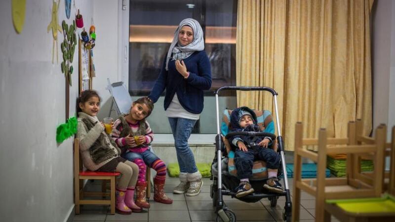 Raneem from Syria together with her children at the EU-funded non-formal education project run by UNICEF/ELIX. Photograph: DG Echo