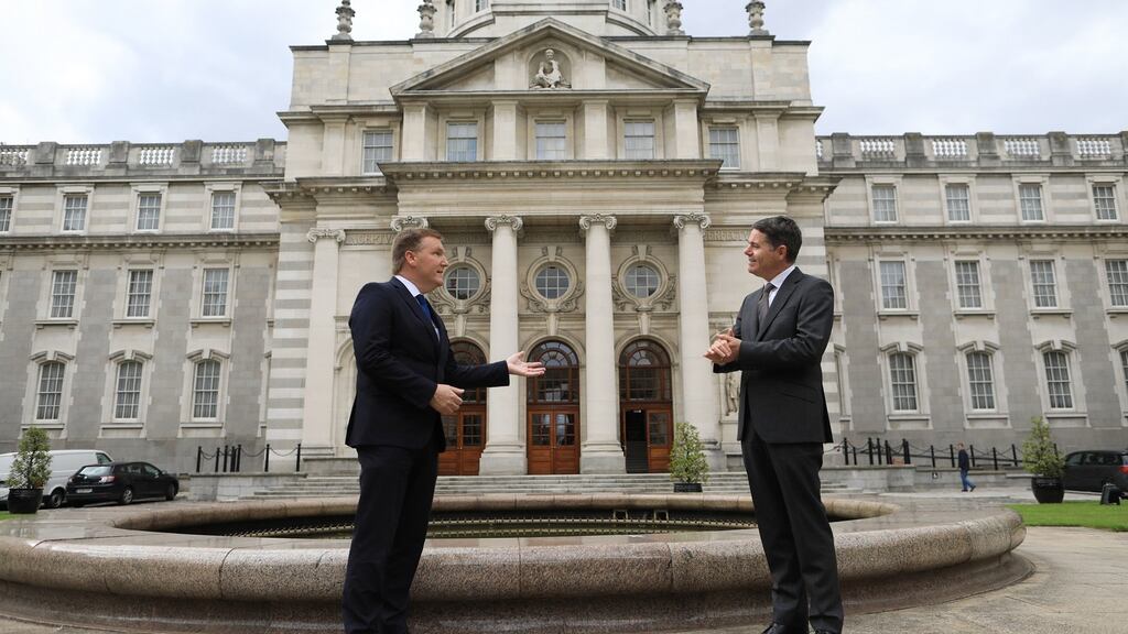 Minister for Finance Paschal Donohoe (R) and Minister for Public Expenditure Michael McGrath are seen ahead of a press conference outside Government Buildings in Dublin on Thursday. Photograph: Julien Behal/PA Wire