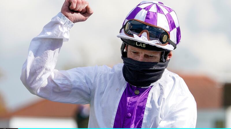 Kevin Manning celebrates his 2000 Guineas win on Poetic Flare. Photograph: Alan Crowhurst/Getty
