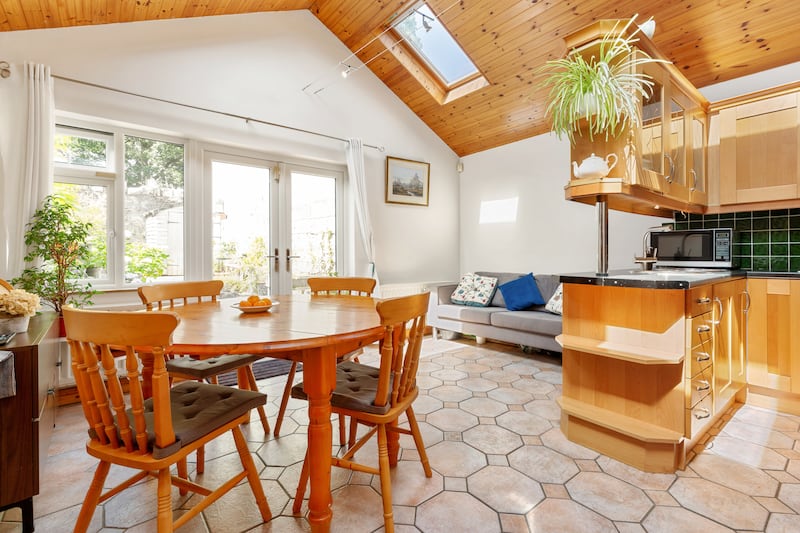 The kitchen/diningroom/livingroom is in the extension to the rear; it is flooded with light. Photograph: Keith Owens