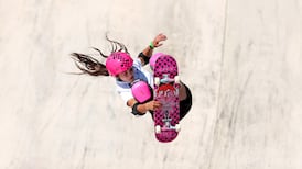 Olympic champion celebrates reign with a duck, but no cats and dogs