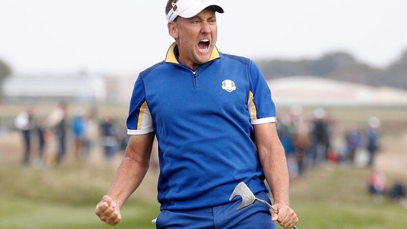 Ian Poulter  reacts to his putt on the 14th green of his match against Dustin Johnson during the Ryder Cup singles on Sunday. Photograph:  Ian Langsdon/EPA