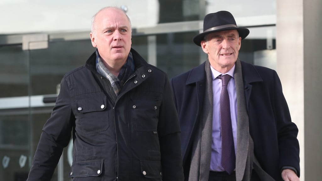 Former Anglo Irish Bank chief executive David Drumm pictured leaving court with his solicitor Michael Staines. Photograph: Collins Courts