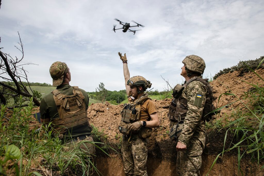Ukrainian soldiers positioned several miles south of Bakhmut operate a drone. Photograph: Tyler Hicks/The New York Times