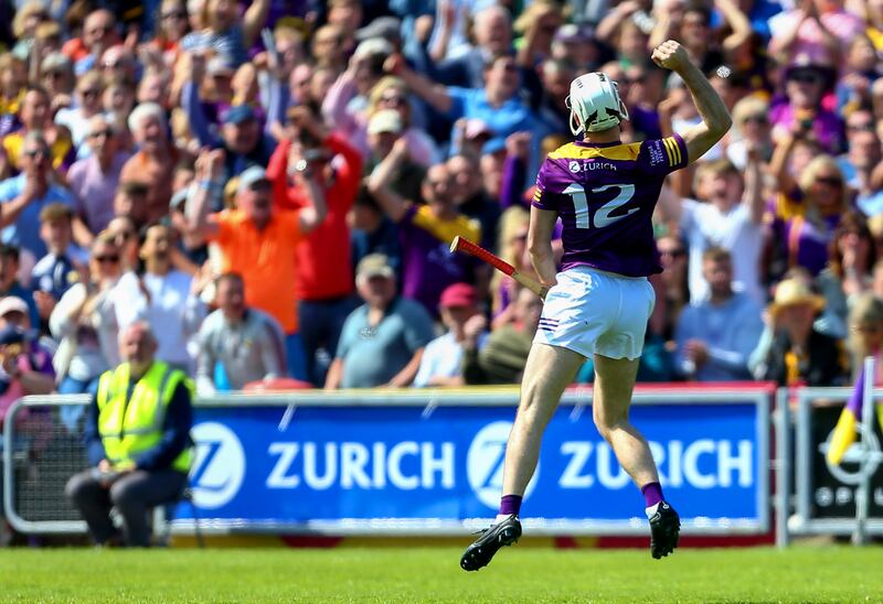 Wexford’s Oisín Foley celebrates scoring a point near the end of the game.  Photograph: Ken Sutton/Inpho
