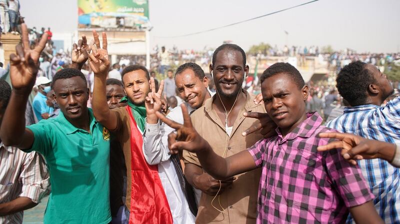 Sudanese protesters celebrate in Khartoum after Omar al-Bashir was ousted from power on Thursday. Photograph: EPA