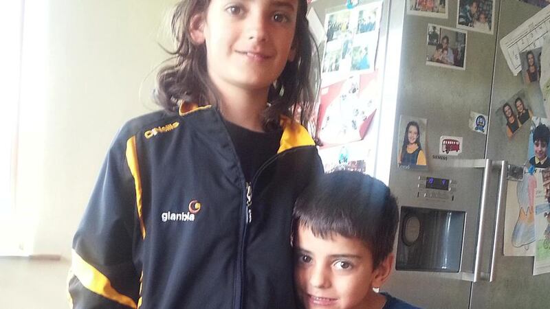 From left, Eoghan  and Ruairí.  Their bodies were discovered in the boot of their father’s car after he crashed near Westport. Photograph: Family handout