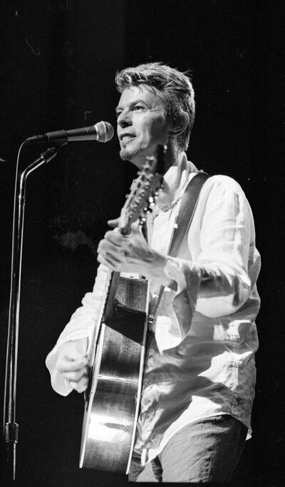 David Bowie performing at the Olympia Theatre, August 1997. Photograph: Independent Newspapers Ireland/NLI Collection/Getty Images