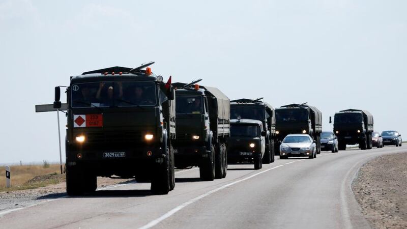 Russian military vehicles drive along the road outside Kamensk-Shakhtinsky, Rostov Region, today. Photograph: Reuters