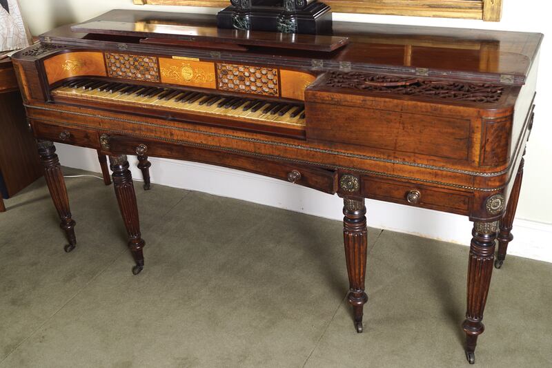 A Regency period mahogany and satinwood inlaid spinet (square piano) made by Astor & Horwood, London