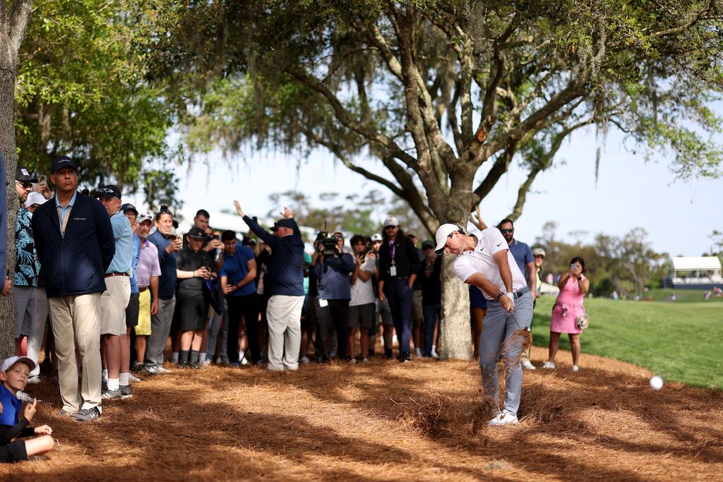 Rory McIlroy plays a second shot from the pine straw on the 16th hole during the first round of The Players Championship at TPC Sawgrass in Ponte Vedra Beach, Florida. Photograph: Richard Heathcote/Getty Images